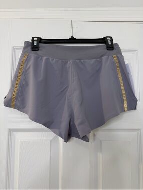 RHONE Women's Light Gray Athletic Shorts with Gold Side Trim